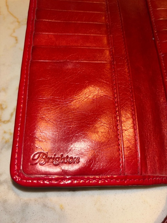 Brighton Red leather wallet featuring a decorative silver-toned snap closure. - Picture 15 of 16